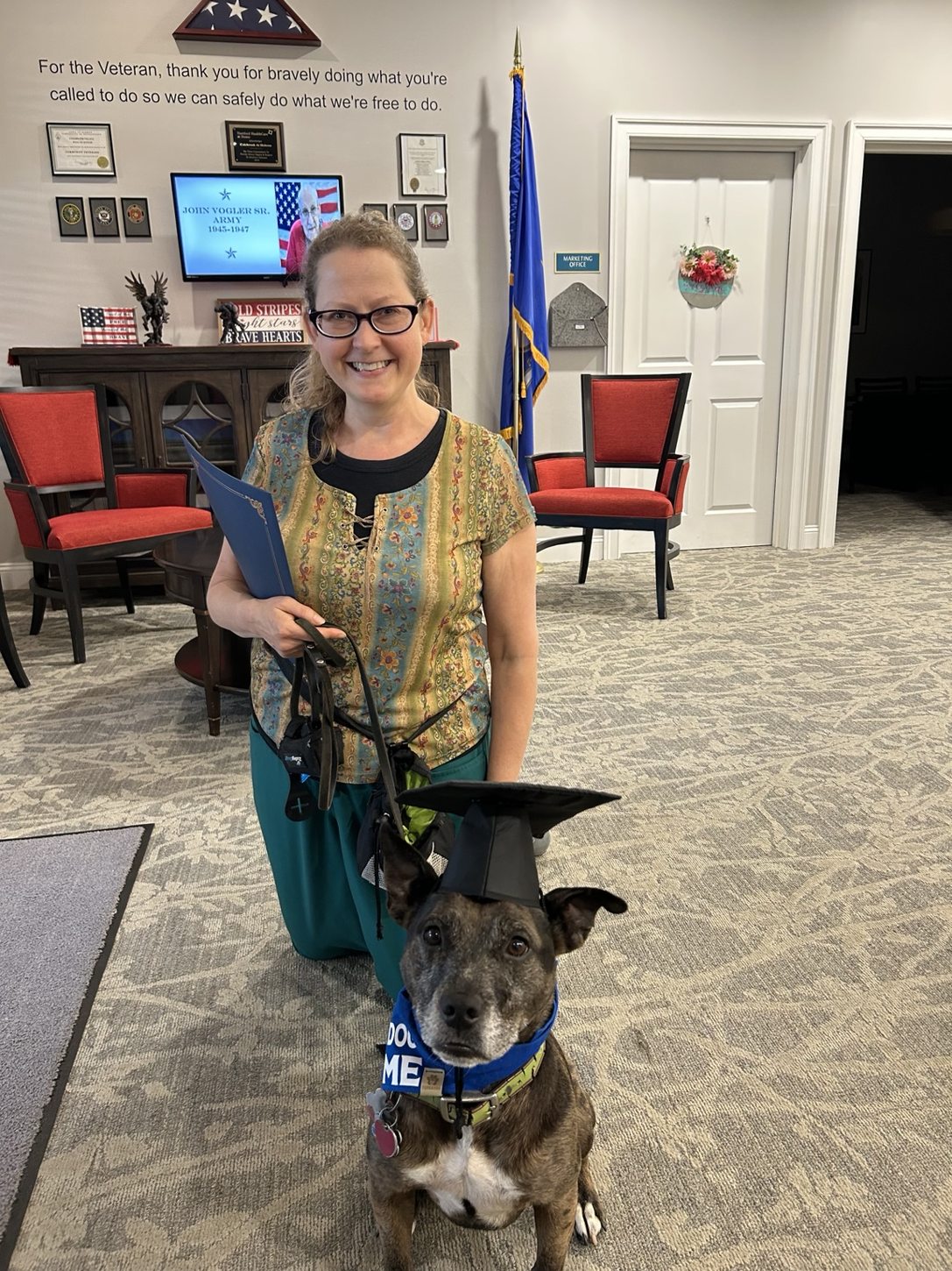 Oakley wearing a graduation cap